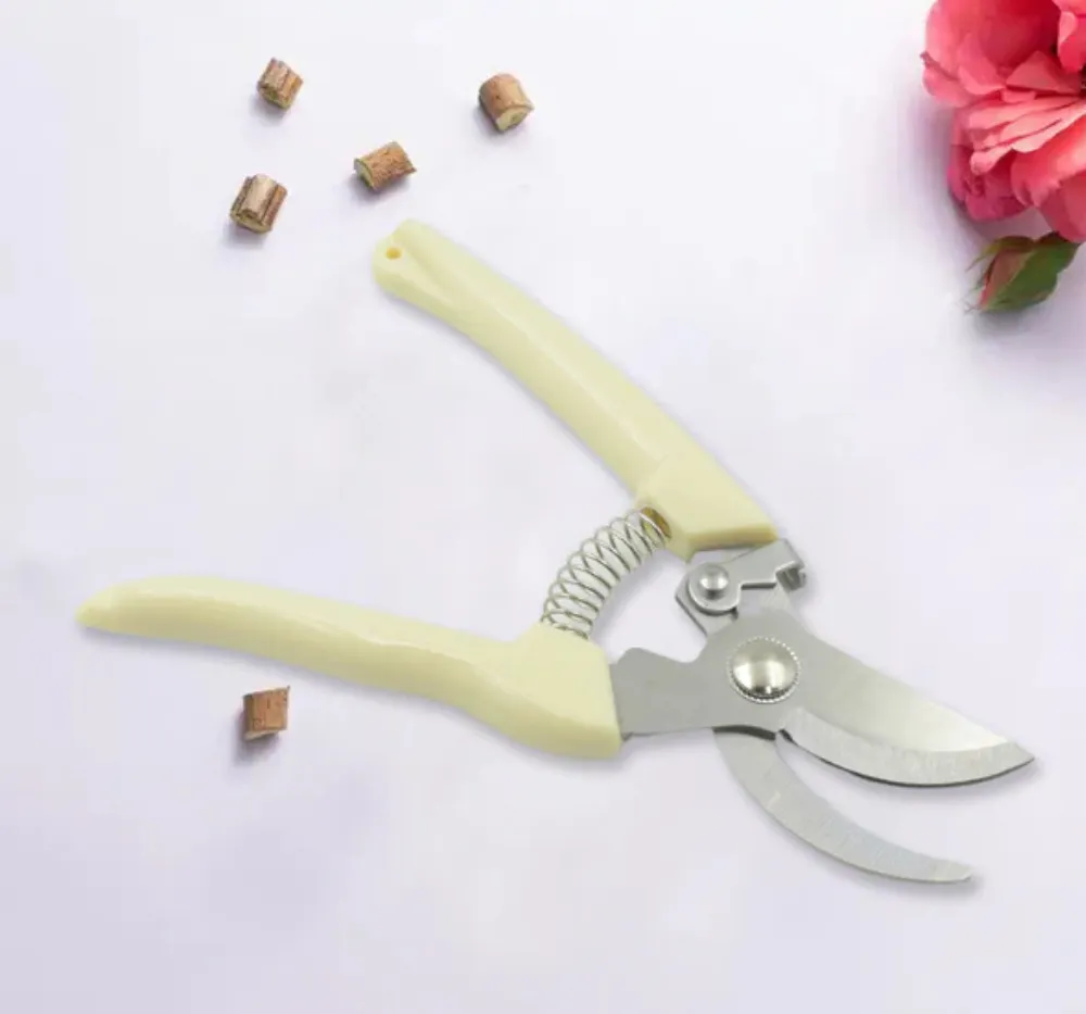 Close-up view of heavy-duty stainless steel pruning shear blades showing sharp edges and durable construction.